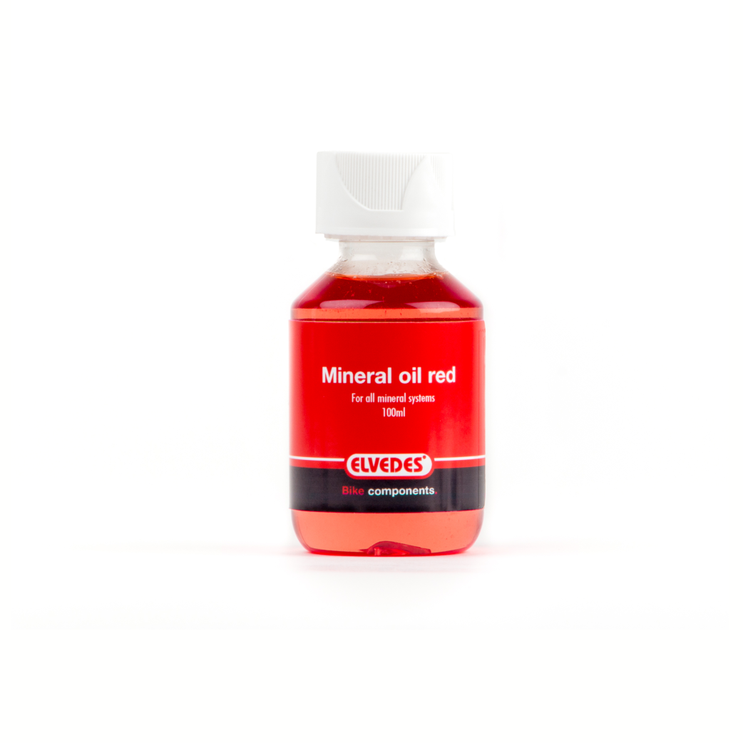 Elvedes minerale olie voor alle minerale remsystemen. Flacon 100ml, kleur rood.